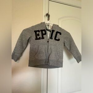 Slightly used adorable Toddlers size 2T zip up hoodie with pockets.